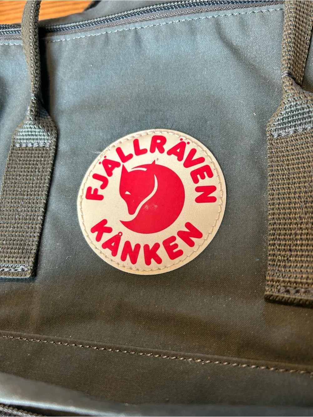 Fjallraven Kanken Classic Backpack in Olive with Red Logo